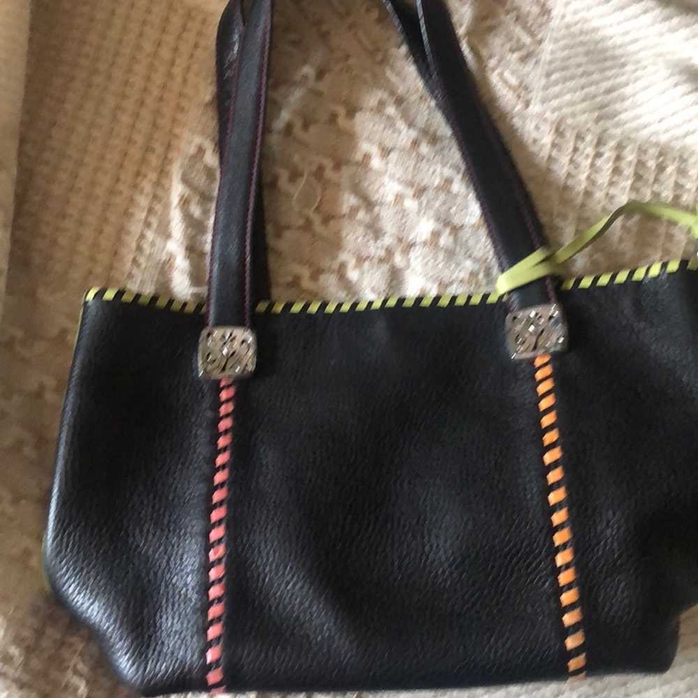 Brighton handbag with one exterior pocket three interior pockets